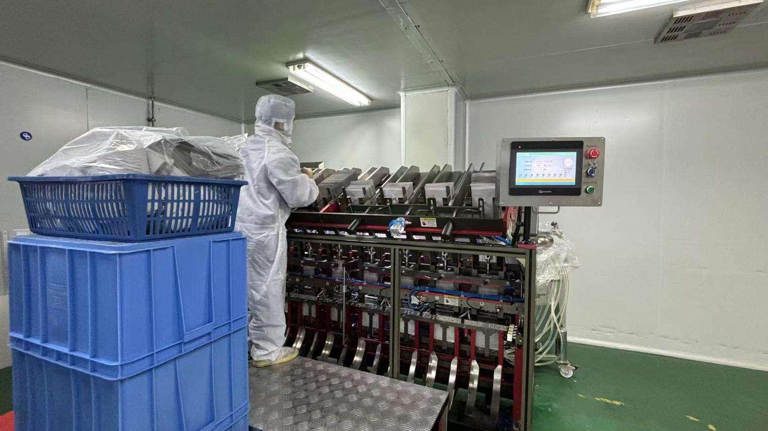 Automated liquid filling line inside ISO 22716 cleanroom